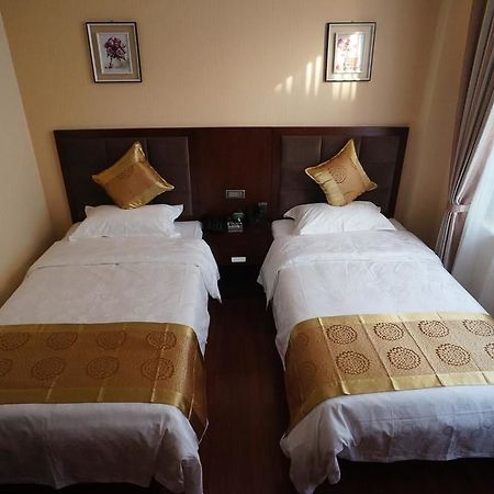 Sunshine Holiday Hotel Liaocheng Bagian luar foto