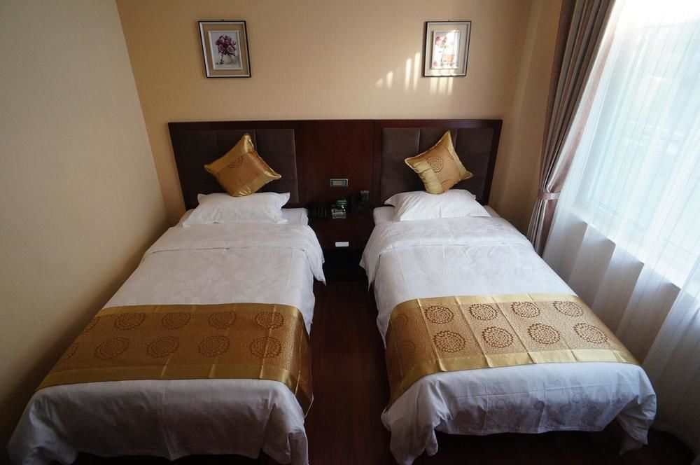 Sunshine Holiday Hotel Liaocheng Bagian luar foto