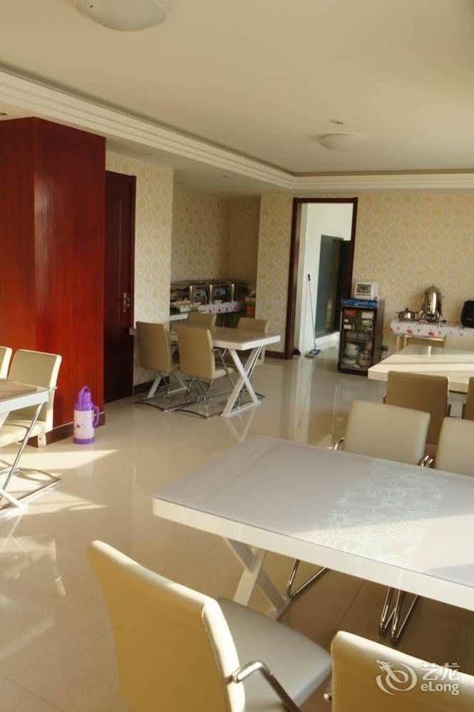 Sunshine Holiday Hotel Liaocheng Bagian luar foto